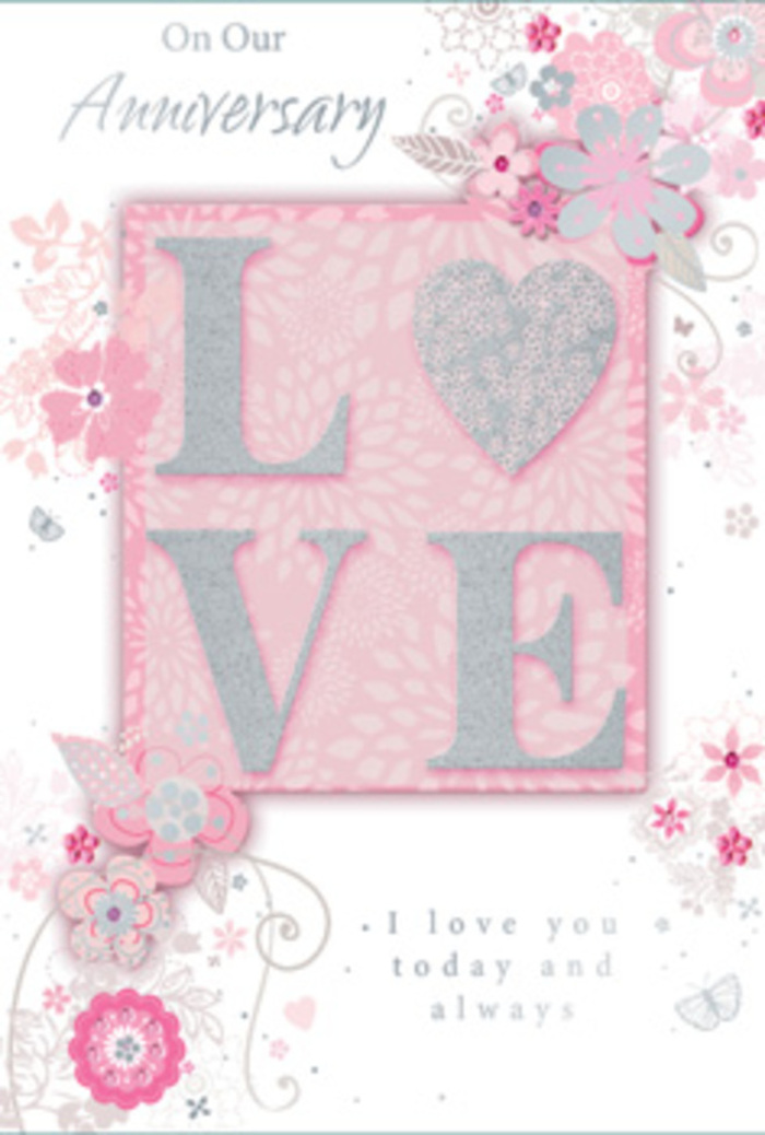 This thoughtfully designed anniversary card feels like stepping into a serene, sunlit room where love is honoured every day-much like the calm of a Byfleet home filled with fresh flowers. The main motif, the word LOVE, is printed in elegant, frosted glitter that rises gently from the card, creating a tactile delight that invites fingertip exploration. Each letter catches the light with a soft radiance, as subtle as morning sun streaming through sheer curtains. Around this central word, wispy, hand-drawn blooms and airy sprays of foliage drift along the borders, their petals painted in soft pink, lilac, and creamy ivory tones that blend together harmoniously. Fine flourishes-filigree lines, slender leaves, and tiny, almost-hidden butterflies-thread through the design, suggesting the flutter of contented hearts on an anniversary morning. The background maintains a gentle, warm blush tone, acting as a quiet stage that lets every petal and swirl stand out without becoming overpowering. Near the lower half of the card, the message I love you today and always is set in graceful, understated type, like a whispered promise between partners who have shared many years together. The composition is balanced and open, with the flowers and flourishes framing the text rather than crowding it, much like a carefully spaced bouquet arranged by an experienced local florist. You can practically imagine this card propped beside a vase of anniversary flowers delivered anywhere in Byfleet, its delicate textures and romantic tones echoing the fragrance and beauty of the blooms it accompanies. It is more than a card; it feels like a hand-tied bouquet captured on paper, quietly fragrant with love and gratitude.
