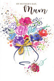 A joyful, artful bouquet blooms across this Mother's Day card, created in swirling watercolours and kissed with delicate gold, much like a hand-tied arrangement dreamt up in a Byfleet flower studio. Lush purples blend into playful pinks, while serene blues and radiant reds add depth and contrast, each petal painted with loose, expressive strokes that keep the composition light and full of motion. Some areas of colour are bold and saturated, others softly translucent, echoing the varied yet harmonious emotions that come with honouring a mother. Fine golden outlines trace portions of the petals and leaves, giving the impression of sunlight glancing across freshly arranged flowers. The bouquet gathers gracefully into a gently curved vase below, suggested by soft washes of colour and completed with an elegant golden bow, evoking the subtle rustle of ribbon when a gift is prepared. Around the flowers, scattered flecks, dots, and tiny heart shapes drift outward like petals tossed in quiet celebration along Byfleet's residential streets. The background remains pure white, creating a spacious, airy feel that lets the colours breathe and shine. The artwork conveys warmth and gratitude without printed words, inviting the viewer to sense the love behind the gesture. It feels like a bouquet preserved on paper, ready to be delivered with a hug on Mother's Day to homes across Byfleet and the nearby communities, every brushstroke carrying affection, appreciation, and the joy of giving something beautifully made.